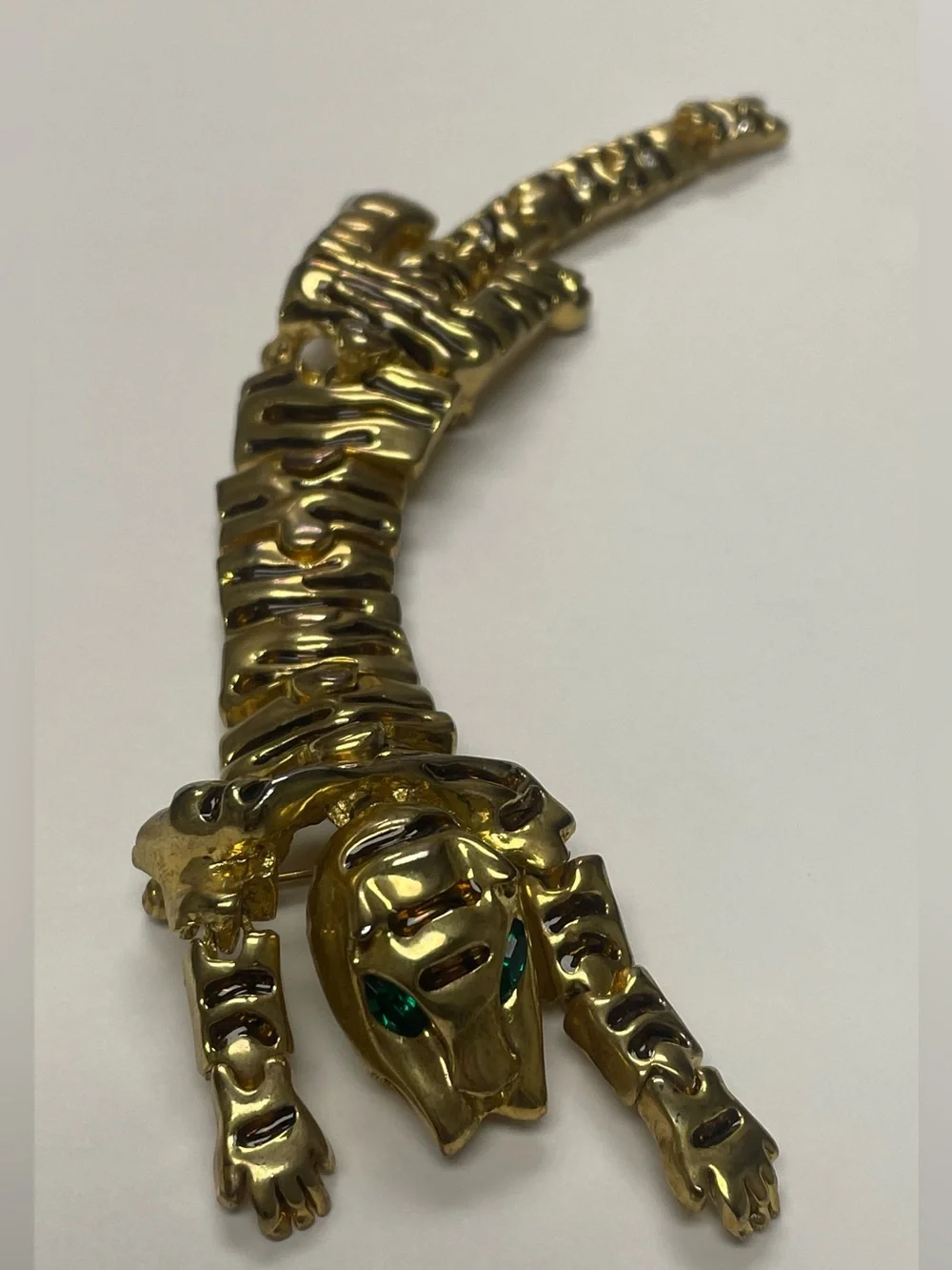Vintage Articulated Gold-tone Prowling Panther Brooch with Green Eyes